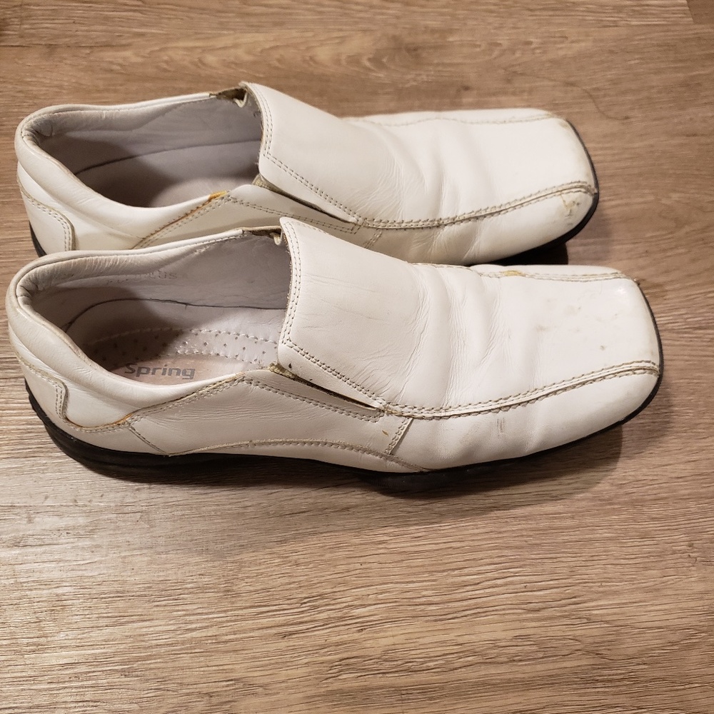 Sleek White Leather: Slip-On Shoes with Captivating Style and Excellent Grip
